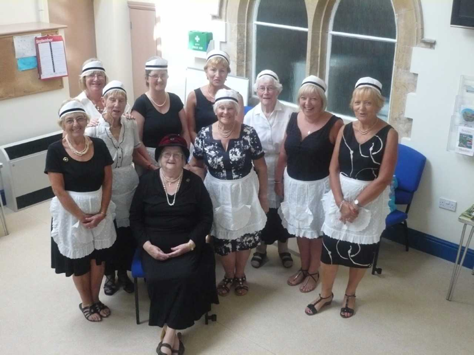 Committee Members dressed up to serve Cream Teas to members as part of our Agatha Christie Afternoon 